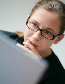 Woman reading on computer